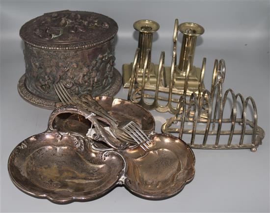 A quantity of plated wares including a biscuit box and pair of dwarf candlesticks.